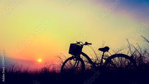 beautiful landscape image with bicycle at sunset in summer ; vintage filter style,Boost up Color Processing