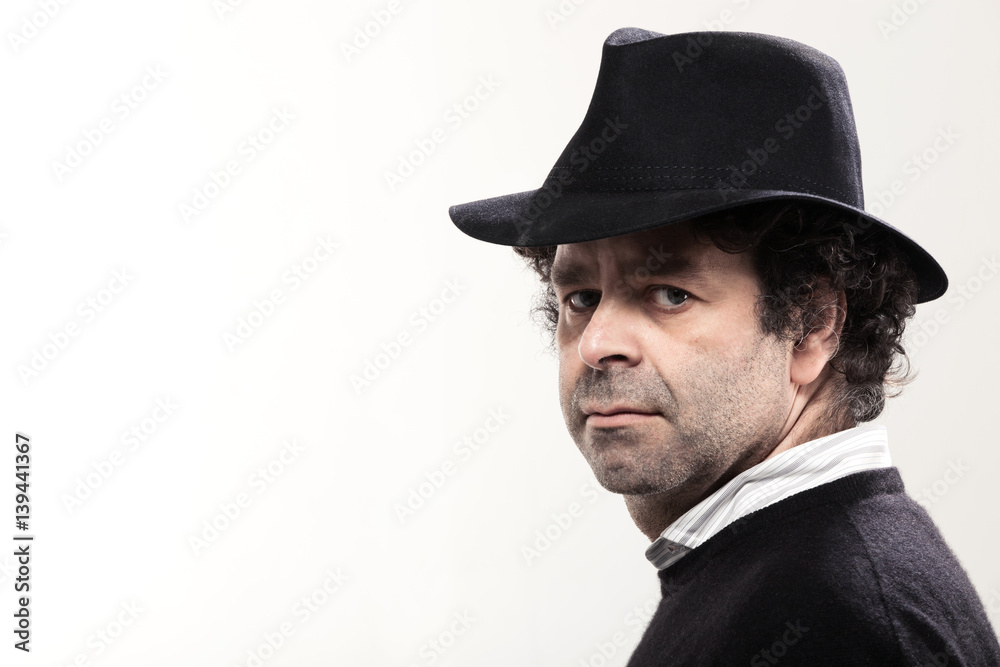Closeup of a man with a black hat Closeup of a man with a black hat