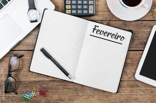 Fevereiro  Portuguese February  month name on paper note pad at office desk