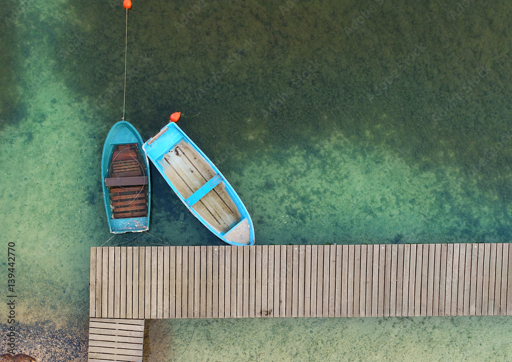 Fototapeta premium Fischerboote am Holzsteg