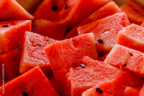slices of fresh ripe red watermelons.