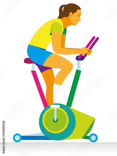 young woman is engaged on a exercise bike in the room