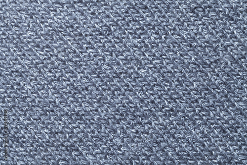 Blue textile background closeup. Structure of the fabric macro