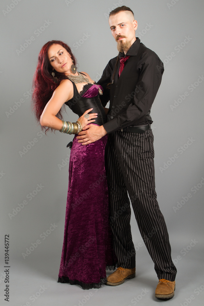 young couple in love posing at studio