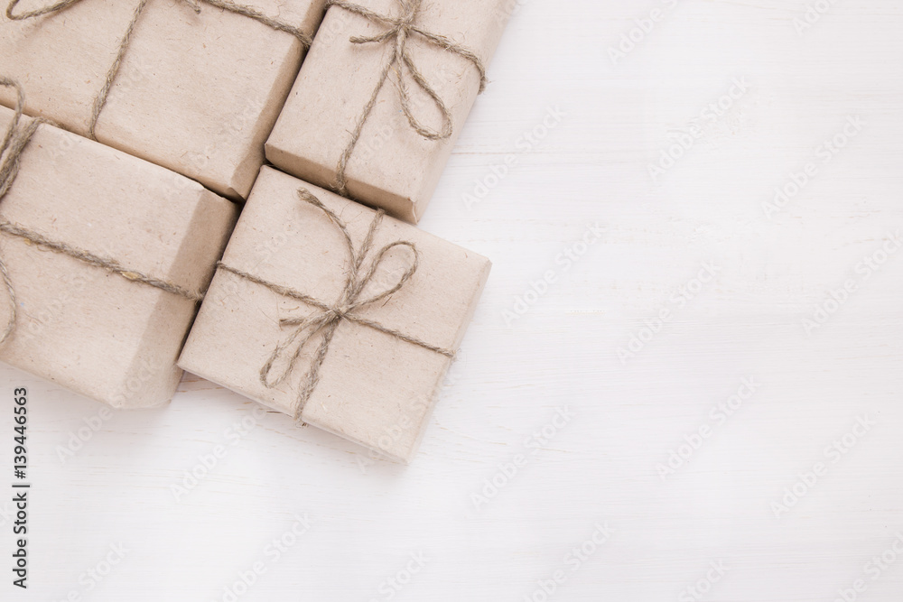 wrapped gifts on a white table wrapped gifts on a white table