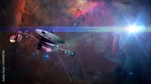 Voyager spacecraft in front of a nebula in deep space photo