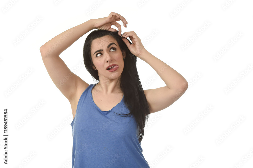 casual portrait of young attractive latin woman fixing her hair with hairpin casual portrait of young attractive latin woman fixing her hair with hairpin