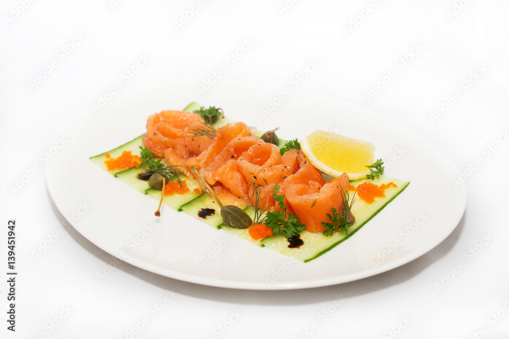 Salted salmon with lemon on white background Salted salmon with lemon on white background