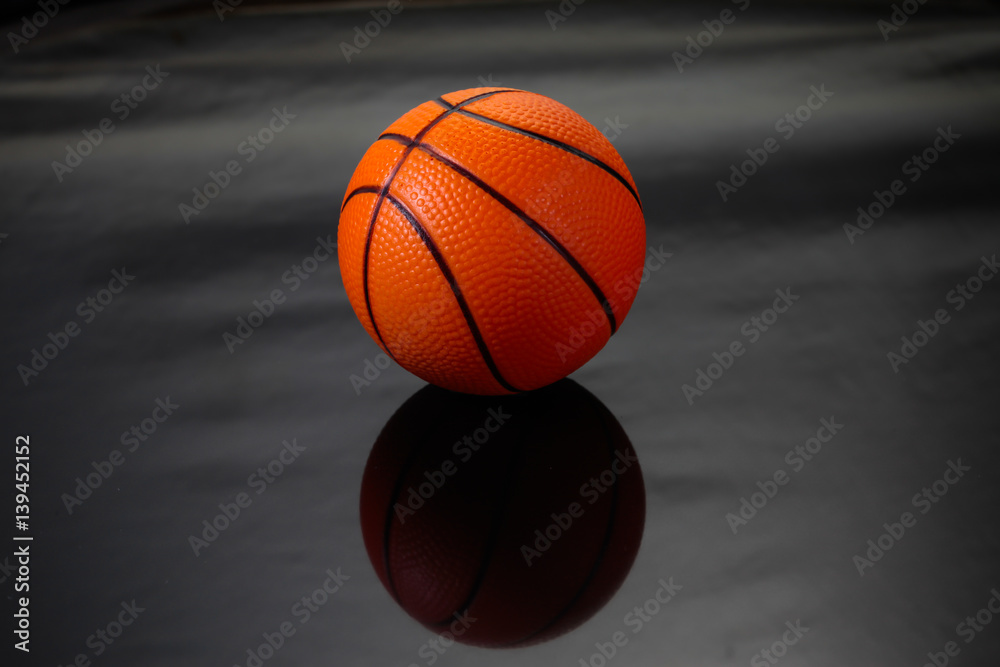 Ball basketball on black background.