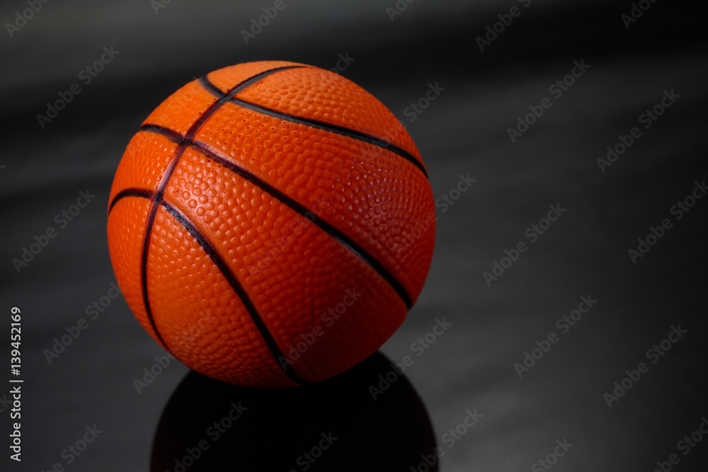 Ball basketball on black background.