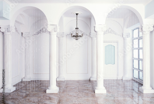 large white room with columns in the classical style