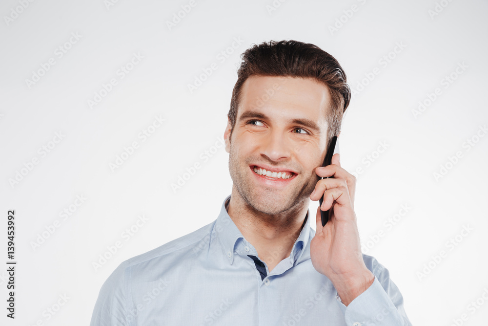 Close up portrait of Man in shirt talking on phone Close up portrait of Man in shirt talking on phone