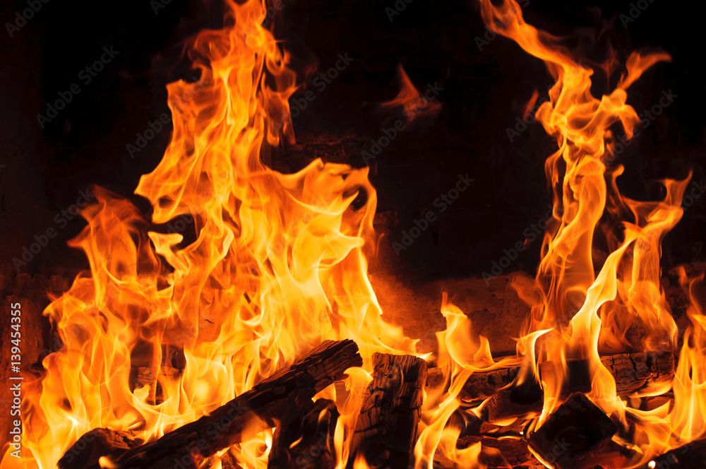 Fototapeta premium Wood fire on black background