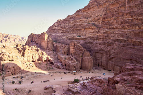The street of facades. Ancient Nabataean city - Petra also known as Rose city or Raqmu. Jordan.