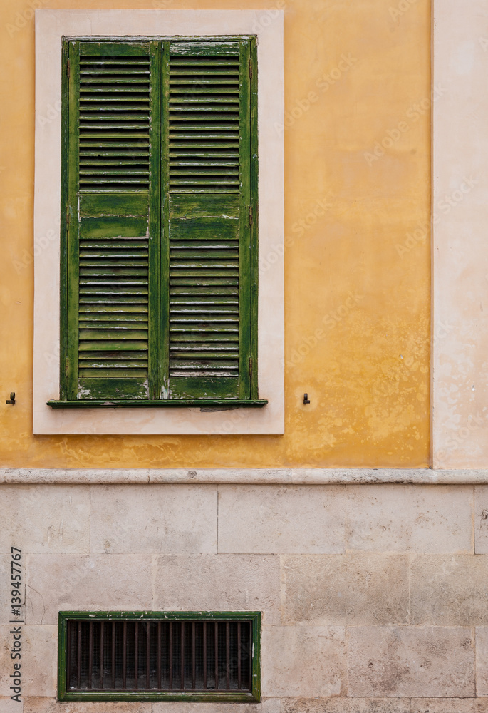 yellow facade in the historical center of ciutadella