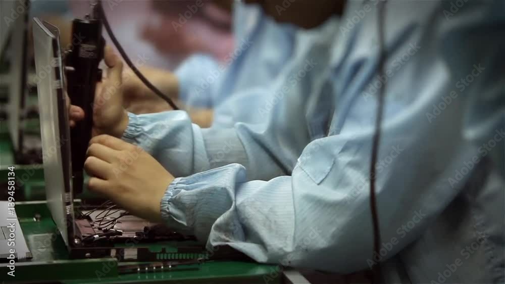 Workers Assembling Computers