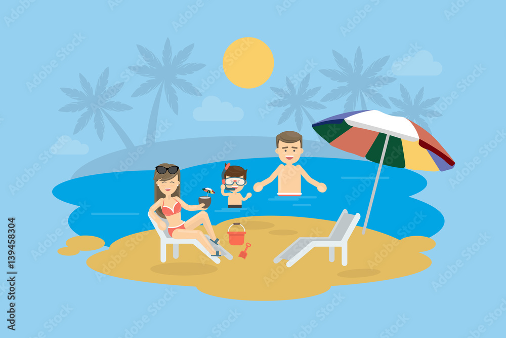 Family at the beach. Happy smiling parents with child swim in the ocean, play in the sand and enjoy the sun.