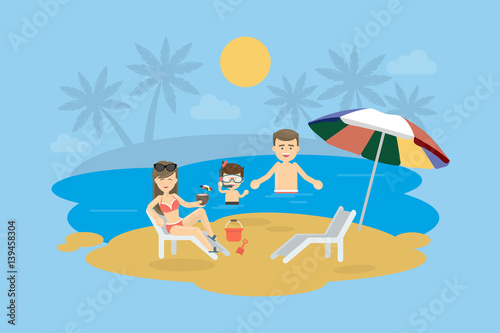 Family at the beach. Happy smiling parents with child swim in the ocean, play in the sand and enjoy the sun.