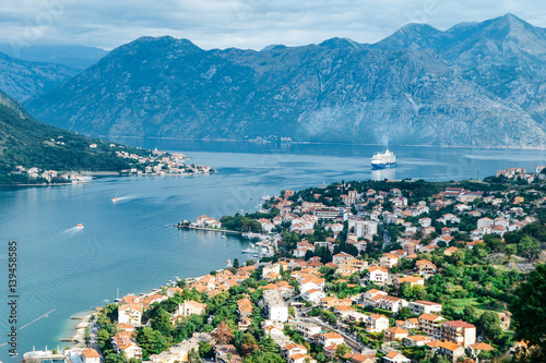 Panoramic view of port, town and mountains in Kotor, Montenegro © ma