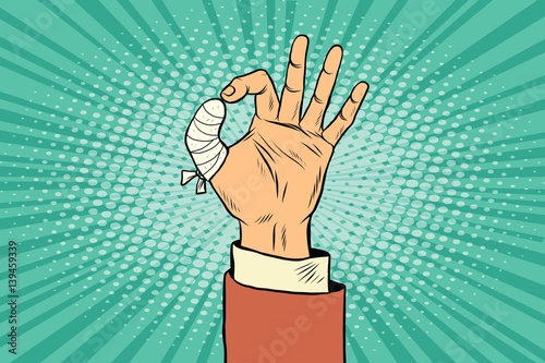 OK gesture bandaged finger