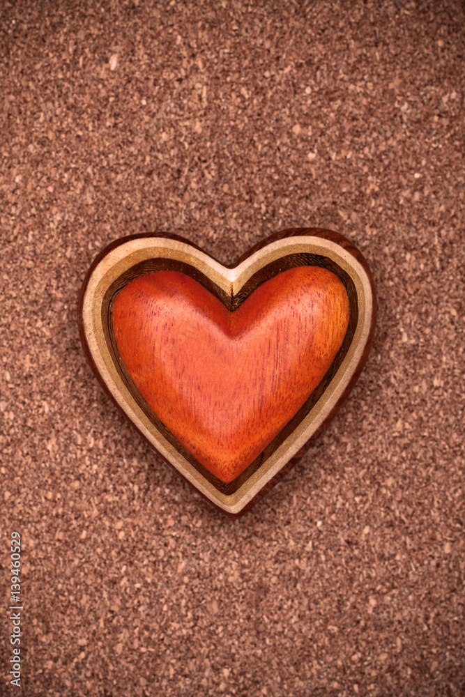 One wooden heart on rustic wood background. Valentines days concept. Love symbol. Greeting card. One wooden heart on rustic wood background. Valentines days concept. Love symbol. Greeting card.