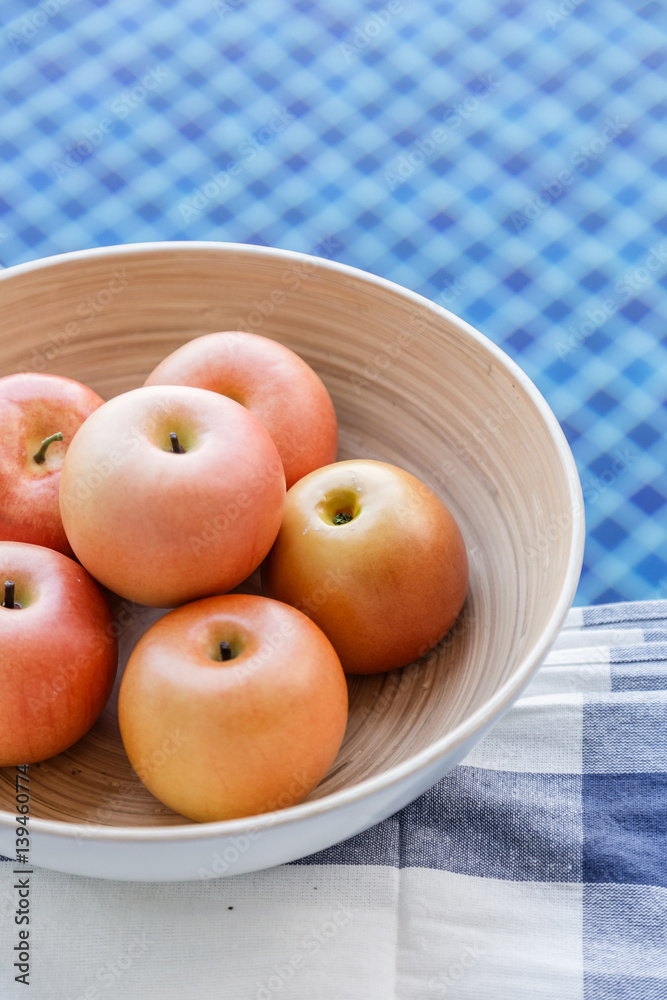 fresh apple in wooden bowl near swiming pool relax and healthy ideas comcept with free copyspace for your text fresh apple in wooden bowl near swiming pool relax and healthy ideas comcept with free copyspace for your text