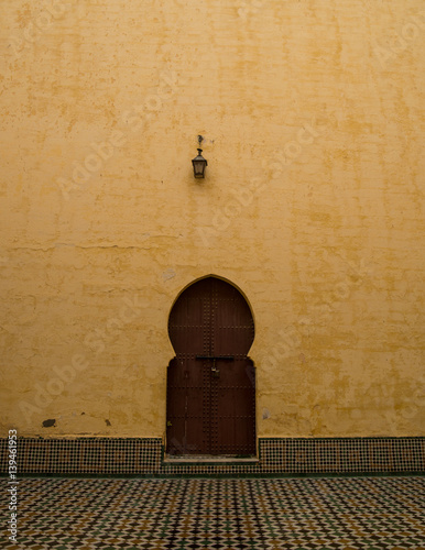 Traditional riad hallway with door photo