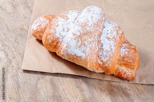 Tasty puff pastry with powdered sugar