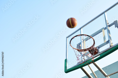 Close up basketball on hoop in the  arena © sawitreelyaon