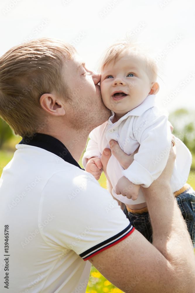 Fototapeta premium Dad and son on the nature,