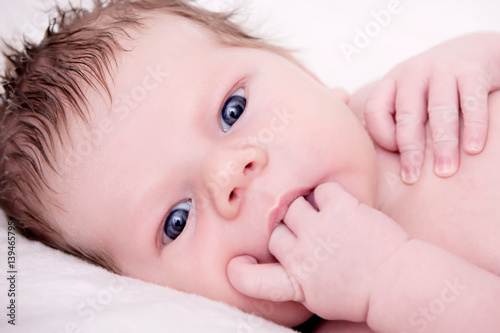Portrait of baby laying on back