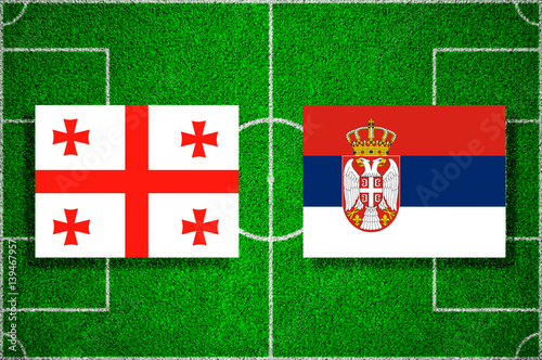 Flags Georgia - Serbia on the football field. 2018 football qualifiers