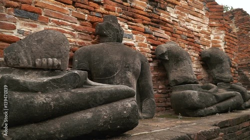 The gallery or Rabieng Khot at Wat Maha That or the Monastery of the Great Relic is located on the city island in the central part of Ayutthaya. Slider stock footage.
 photo