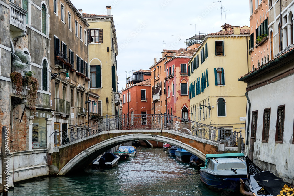 View of a canal with a bridge in Venice, Italy