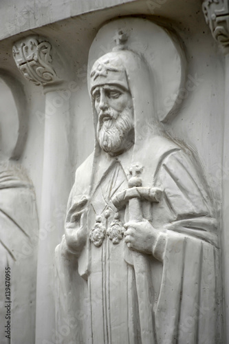 Patriarch Tikhon of Moscow. Detail of the monument to Saint Olga by sculptor Vyacheslav Klykov in Pskov, Russia. photo