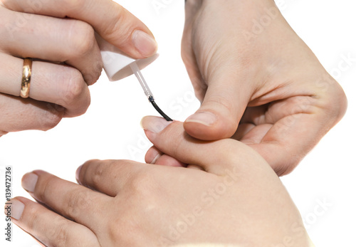 Girl makes manicure