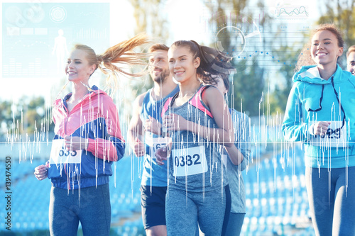 Sportsmen running at stadium