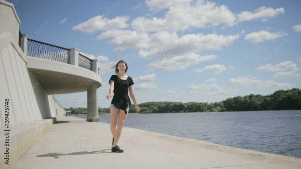 Dancer young woman outdoors spinning around. Slow motion Dancer young woman outdoors spinning around. Slow motion