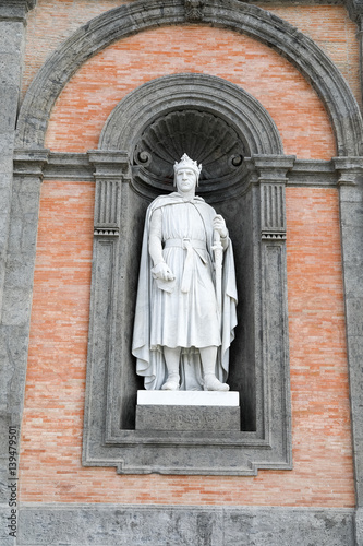 statue on facade of the Palazzo Reale