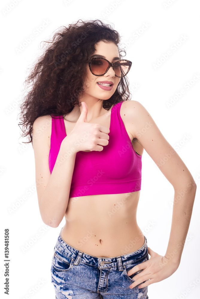 Happy summer young woman giving thumbs up Happy summer young woman giving thumbs up