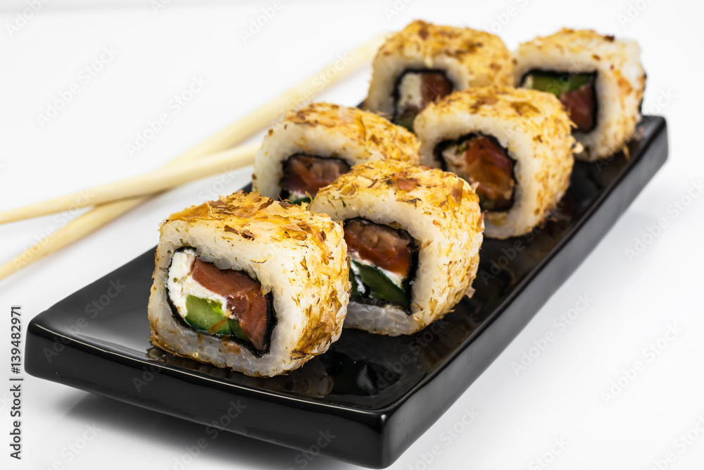 Japanese food rolls with fish and avocado Japanese food rolls with fish and avocado