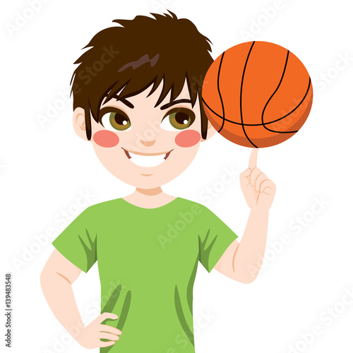 Young boy spinning basketba...