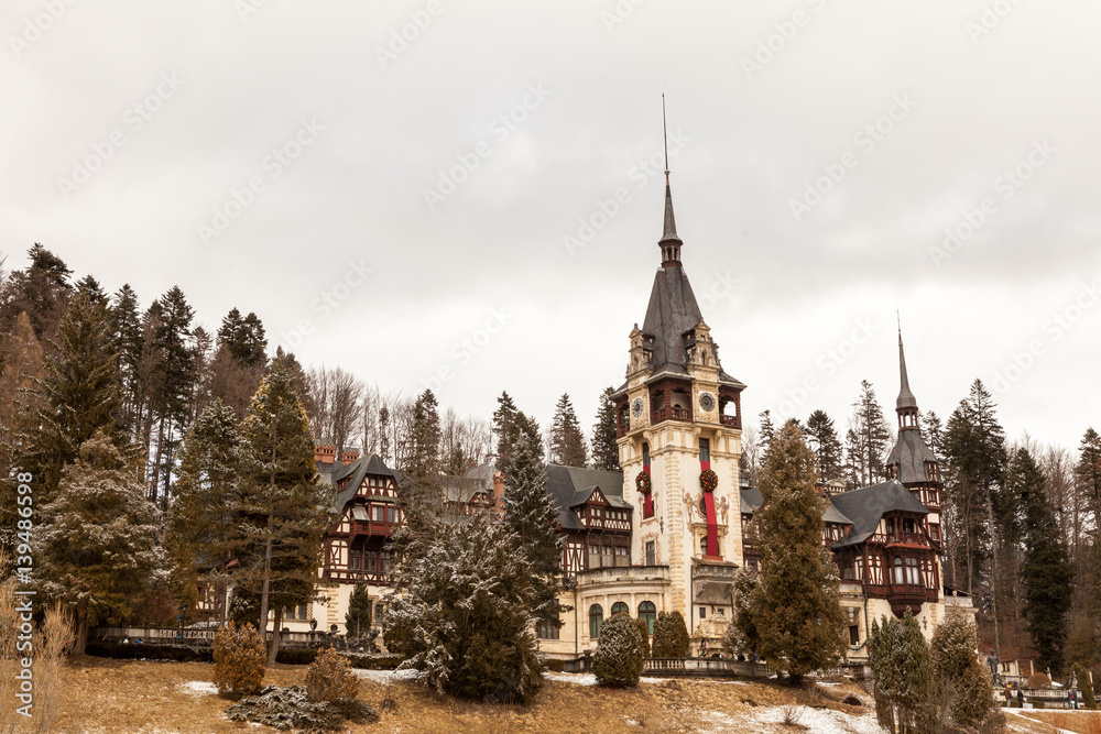 Beautiful view of Peles castle from Sinaia in winter. Romania