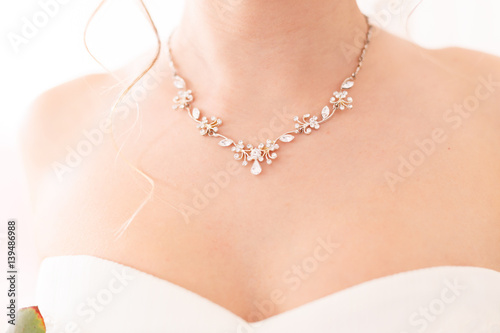 Decoration on the brides neck in high light style