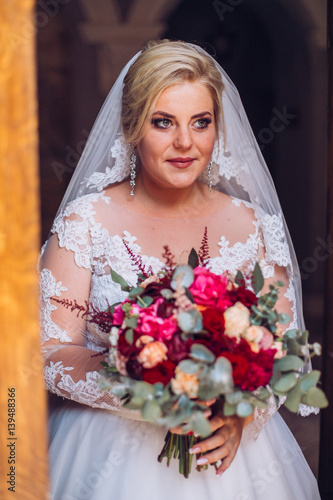 bride portrait near old door one