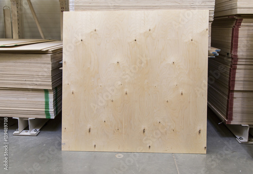 the woodworking factory, storage of treated wood, stacks of wooden planks
