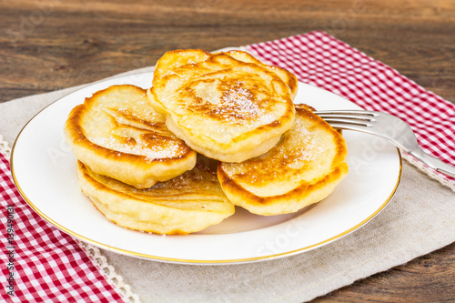 Εκτύπωση καμβά Lush sweet fritters on white plate