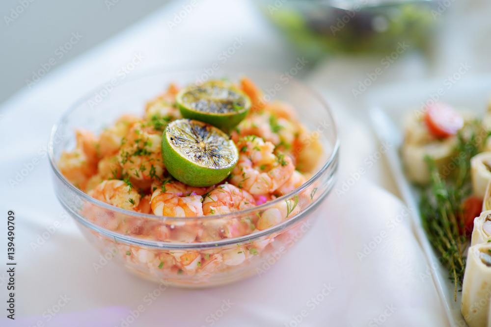 Delicious shrimp salad served on a party or wedding reception Delicious shrimp salad served on a party or wedding reception