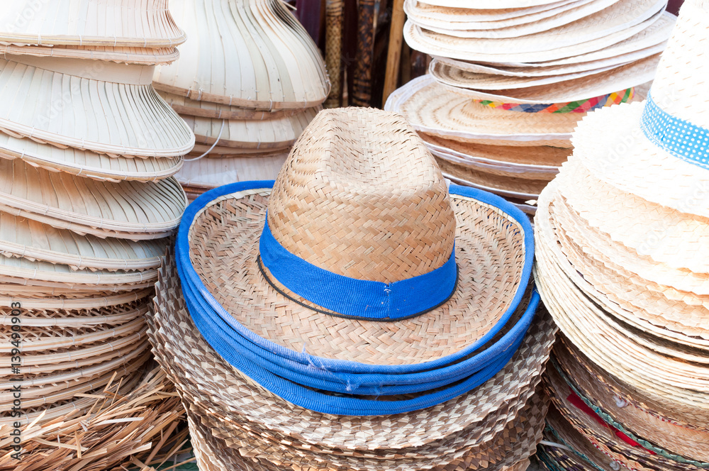Handmade hats woven from bamboo hats arrangement on market hand craft shop