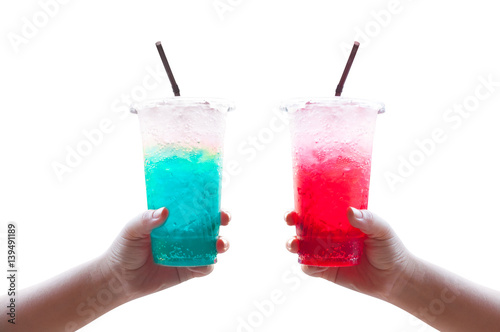 Принти на полотні Women handle holding ice water italian soda red and blue in plastic cup ,Isolate
